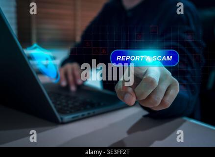 User pressing report a scam button on digital interface with warning icons and cybersecurity shield background. Concept of online fraud reporting, cyb Stock Photo