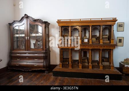 Old bookshelf in the Paarl Museum, Paarl, South Africa Stock Photo