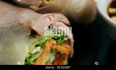 Fresh spring rolls with thinly sliced meat and crisp vegetables Stock Photo