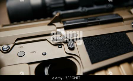 Tan Assault Rifle Modern tactical rifle with tan receiver and safety selector Stock Photo ...