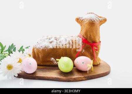 Easter lamb cake with decorative eggs and flowers Stock Photo