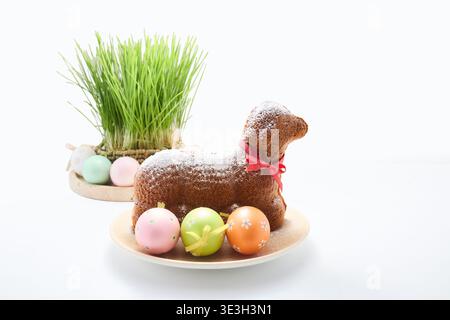 Easter lamb cake with decorative eggs and green grass Stock Photo