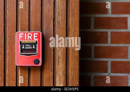 Fire Alarm zone alert warning switch pull stations, wall mount around building safety equipment. Stock Photo