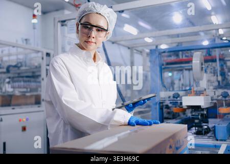 Hygiene inspector certify stuff officer work in science factory laboratory. people in pharmaceutical medicine production process inspector. Stock Photo