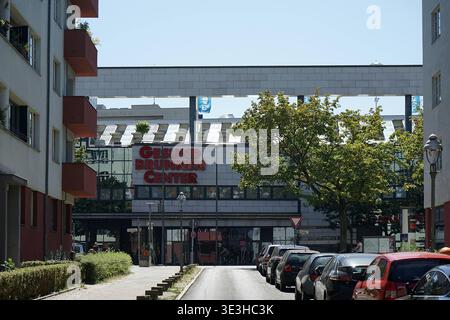 Gesundbrunnen-Center, large shopping mall with glass roof atrium, escalators and retail stores, Wedding, Berlin, Germany, August 2018. Stock Photo