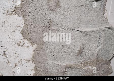 Detailed Close-Up of Textured Concrete Surface with Varied Shades and Patterns of Gray Stock Photo