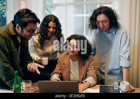 Creative Minds Exchanging Ideas Actively, Group Engaged In Innovative Design Brainstorming Session Stock Photo