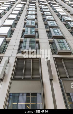 Low angle view of modern high-rise building facade Stock Photo