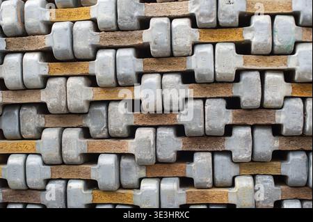 Intricate array of steel and wood elements arranged in a visually striking pattern, showcasing textures and colors that inspire unique graphic design Stock Photo