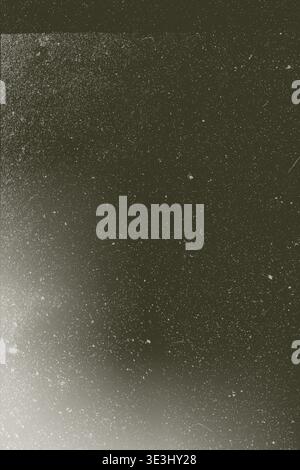 Soft gray gradient with central glow and grunge overlay of noise grain plus subtle scratches, blurred texture, horizontal banner with copy space Stock Photo
