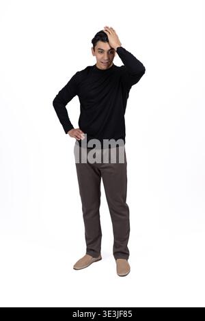 Man scratching his head and looking confused on white background Stock Photo