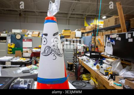 Auburn Hills, Michigan - A face drawn on a safety cone while Vice President JD Vance held a rally at EDSI (Engineering Design Services Inc),  a suburb Stock Photo
