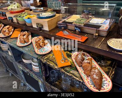 Italian hotel breakfast buffet selection featuring croissants, ricotta cheese, and preserves for a morning meal in Rome, Italy. Stock Photo