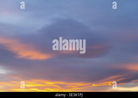 Dramatic colorful clouds at sunset with deep blue and orange, Pamukkale, Denizli, Anatolia, Turkey Stock Photo