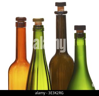 Close-up of a few empty closed wine bottles against a white background Stock Photo