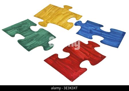 Four hand-painted puzzle pieces one by one on a white background Stock Photo