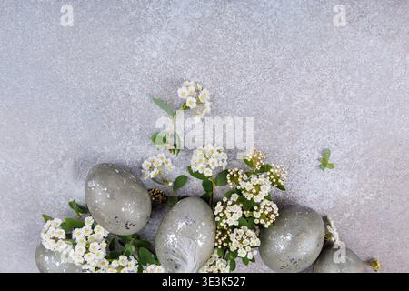 Easter eggs spring floral arrangement top view Stock Photo