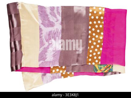 Handmade patchwork silk scarf for sewing from narrow pieces of fabric, against a white background Stock Photo
