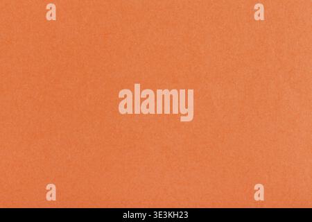 Dark orange fiber paper background, close-up Stock Photo
