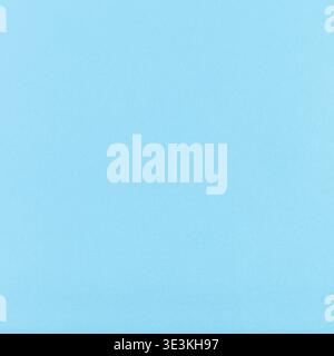 Square background made of light blue tinted sheet of paper Stock Photo