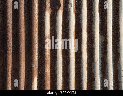 Industrial background featuring rust and corrugated structure. Stock Photo