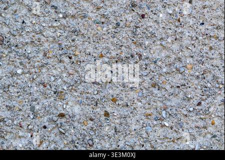Gravel and small stones texture with natural pattern, abstract ground background, neutral surface for design use, minimal outdoor material with natura Stock Photo