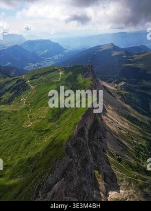 Rocky barren terrain landscape lines a fast flowing glacier water river ...