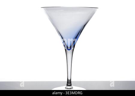 Empty Blue-Tinted Margarita Glass – Isolated Close-Up on White Background Stock Photo