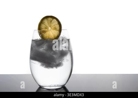 Refreshing Iced Water with Lemon Slice – Isolated Minimal Beverage Concept Stock Photo