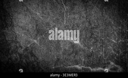 Dark textured marble background with intricate veining patterns, suitable for design projects, wallpapers, and various artistic applications Stock Photo