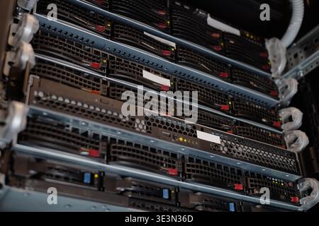 Closeup of Network Server Racks Operating in Modern Data Center Environment Stock Photo