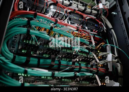 Network Server Rack Displaying Data Cables Transmitting Information Stock Photo