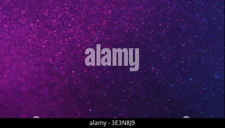 Blur glitter texture. Gradient background. Neon purple blue color glow water bright dazzle acrylic flow on art illuminated bokeh light abstraction. Stock Photo