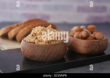 hazelnut spread in a bowl on a table  Stock Photo