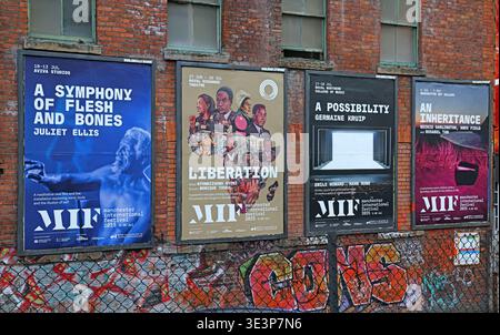 Manchester International Festival 2025 posters near Shudehill tram stop, advertising contemporary art, theatre and culture events. Stock Photo
