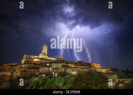 Thunderstorm over the city of Siena, Tuscany, Italy. Stock Photo