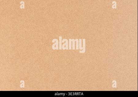 Cardboard brown paper surface macro close up view Stock Photo