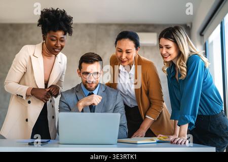 Team of programmers writing digital code in the metaverse and working together on the internet Stock Photo