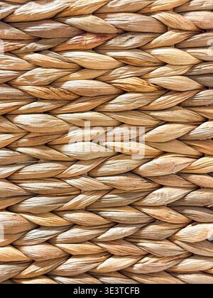 Close up view of the pattern of the side of a wicker basket. No people. Stock Photo