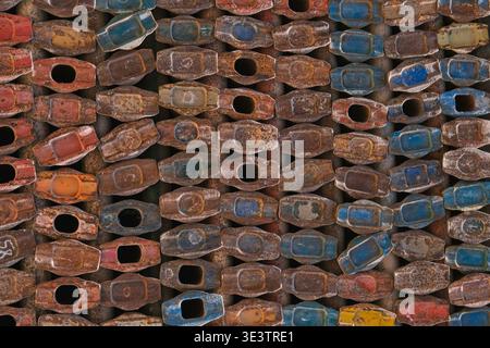 Rusty metal scaffolding components arranged in repeating pattern. Industrial texture background  Stock Photo