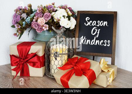Season Of Kindness message written on easel blackboard Stock Photo