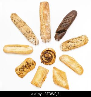 Various freshly baked baked goods in sun shape on white background Stock Photo