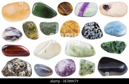 Set of various polished natural mineral stones and gemstones - clinohumite, zoisite, snowflake obsidian, unakite, iolite, aventurine, fluorite, aquama Stock Photo