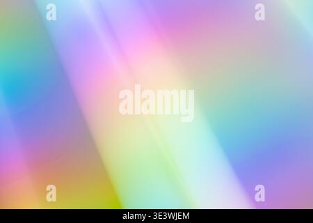 A vibrant abstract background with a neon gradient featuring smooth transitions of pink, blue, green, and yellow hues. Ideal for modern, digital, or c Stock Photo