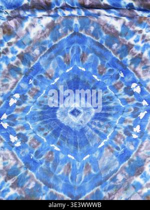 Silk scarf with abstract blue geometric ornament, hand painted using knot technique Stock Photo
