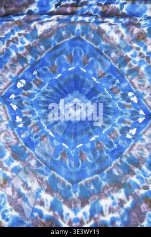 Silk scarf with abstract blue geometric pattern, hand painted using knot technique Stock Photo