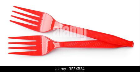Two red plastic forks isolated on white, top view Stock Photo
