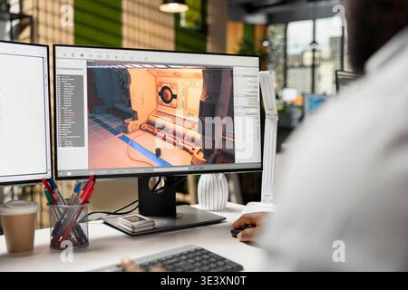 Game developer, works on video game, designing futuristic adventure in space. Black programmer uses modeling tools, animation software and programming commands for a virtual world. Stock Photo