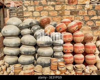 A huge pile of red and black household storage pots has been heaped up at a ceramics factory near Jodhpur in India. Stock Photo