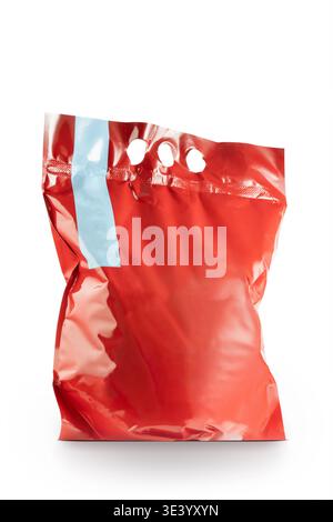 Red blank plastic packaging bag isolated on white background, mockup template for branding, product packaging design, minimal retail container, generi Stock Photo